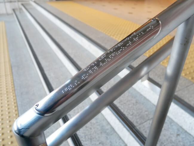 handrail with braille photo